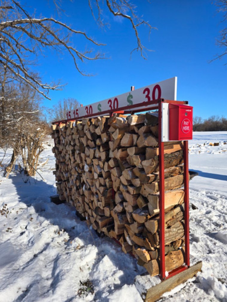 Liberty Firewood roadside self-service firewood rack in Clinton Michigan
